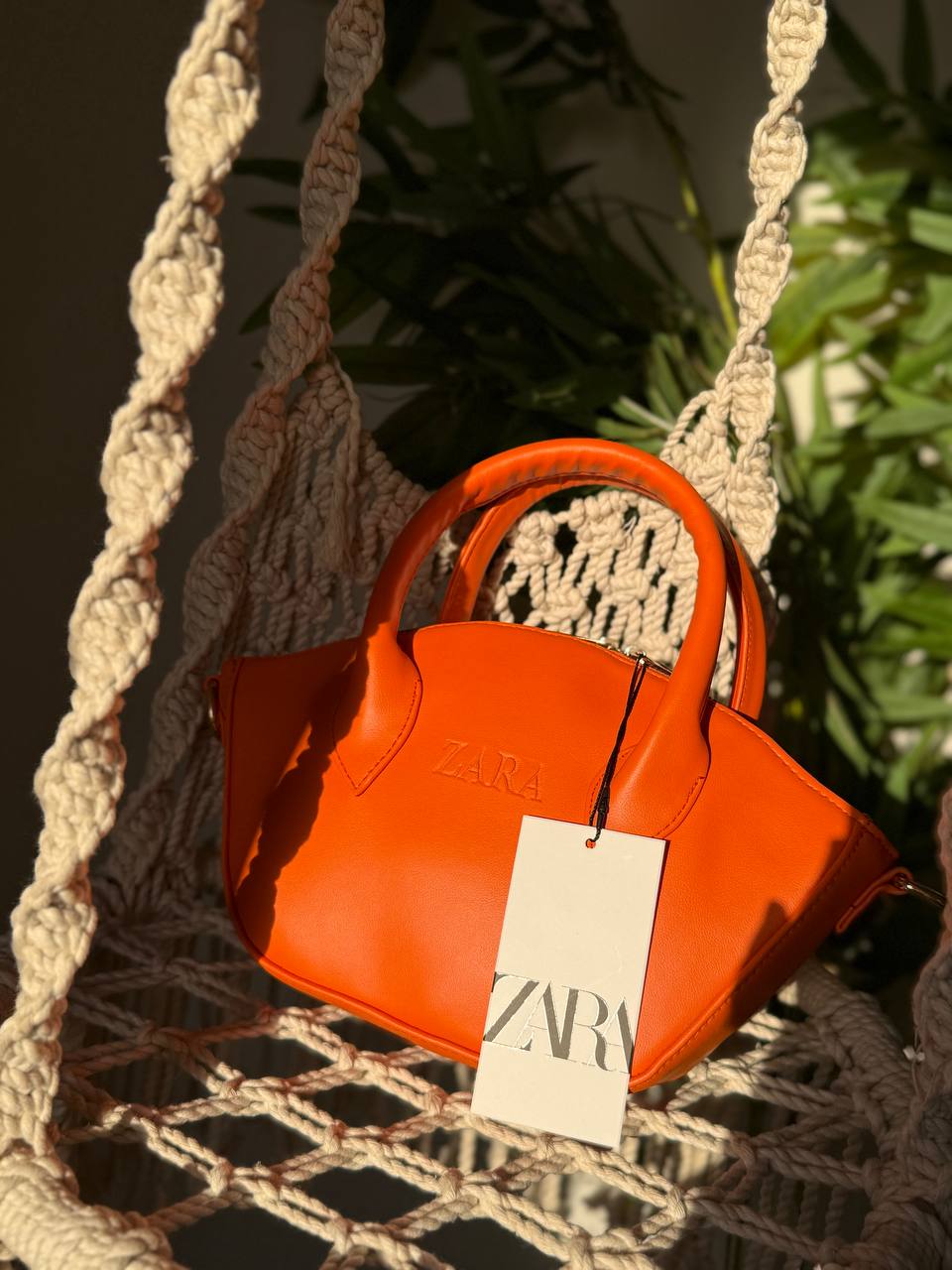The Sculpted Curve Handbag
