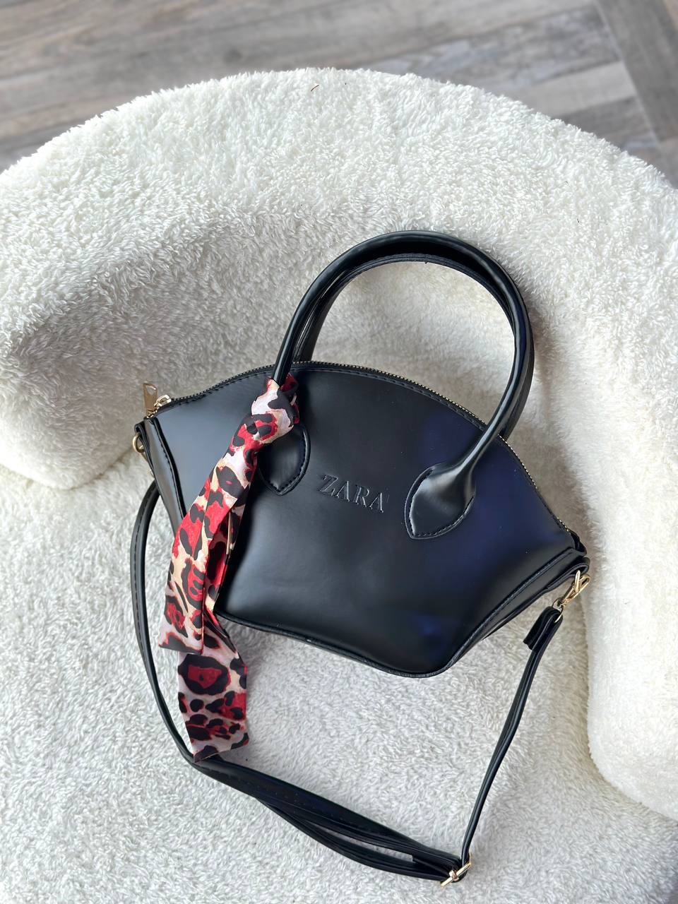 The Sculpted Curve Handbag