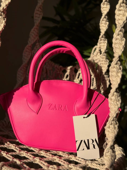 The Sculpted Curve Handbag