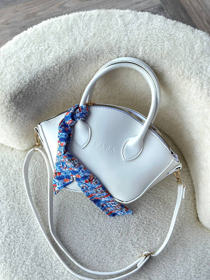 The Sculpted Curve Handbag